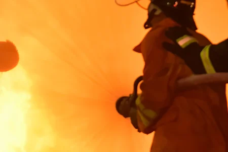 firefighters fighting fire closely outside
