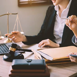 A lawyer and a client discussing at an office