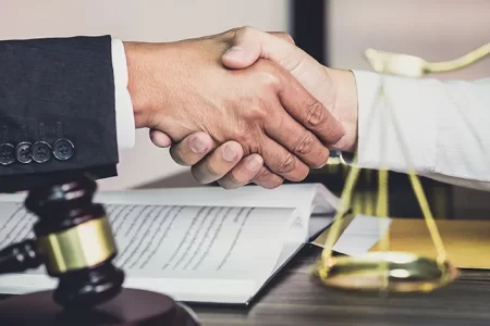 Shaking hands as agreement to a lawyer