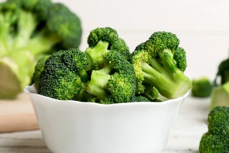 Fresh broccoli on a white bowl