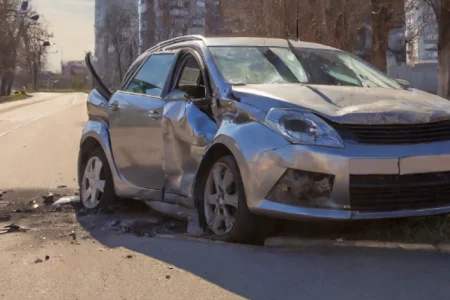 A damaged car due to pedestrian's fault