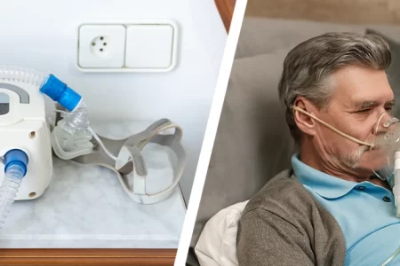 Man in bed using CPAP Machine to help him