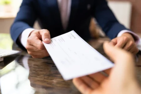A man receiving his payroll