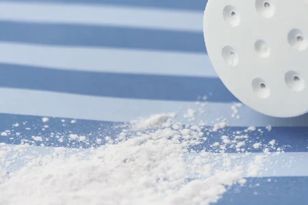 Spilling talc powder on a table