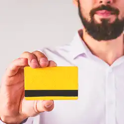 A person holding a credit card