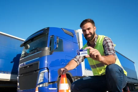 Man showing off his new CDL