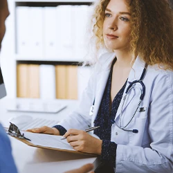 A doctor looking up the effects of the camp lejeune accident