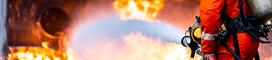 Firefighter putting out a fire
