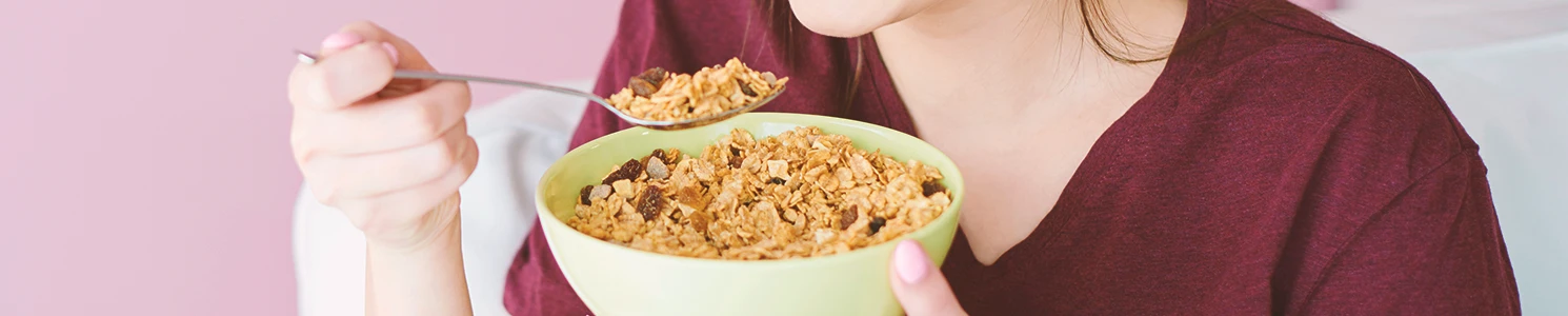 A woman eating glyphosate free cereal