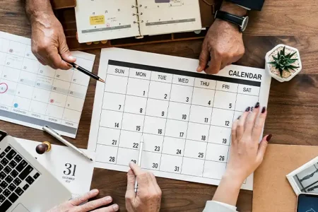 a picture of people having a meeting