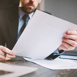 A lawyer looking at a paper