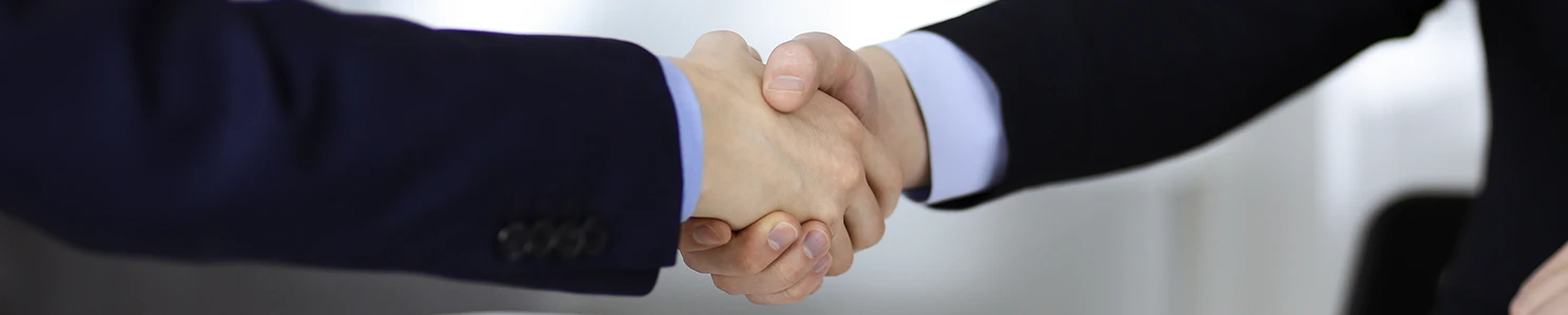 Two people closing a deal