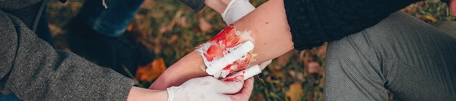 A person having a first-aid due to serious injury