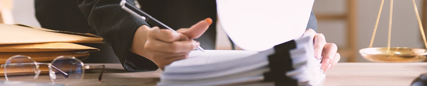 A lawyer looking through paperwork