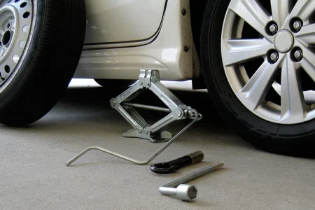 A Hyper Tough Jack Stand used on a car