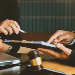 A lawyer and client discussing between each other