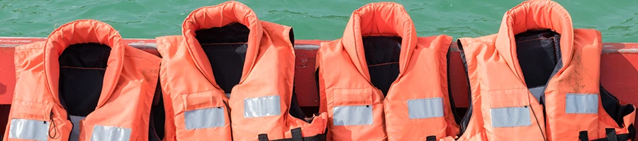 A boat with life vests as safety equipment