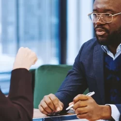 A lawyer listening to a client