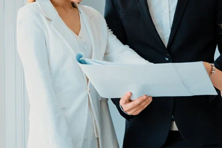 A lawyer and client discussing a lawsuit