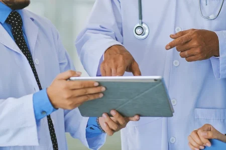 Doctors talking about negligence and malpractice