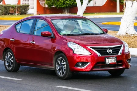 A Nissan Versa on the road
