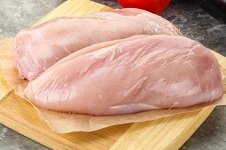 A raw Raeford Farms chicken breast