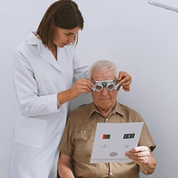 A doctor checking for retinal detachment symptoms