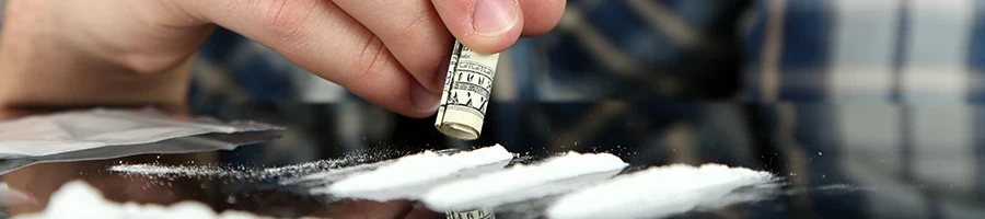 A close up shot of cocaine on a desk