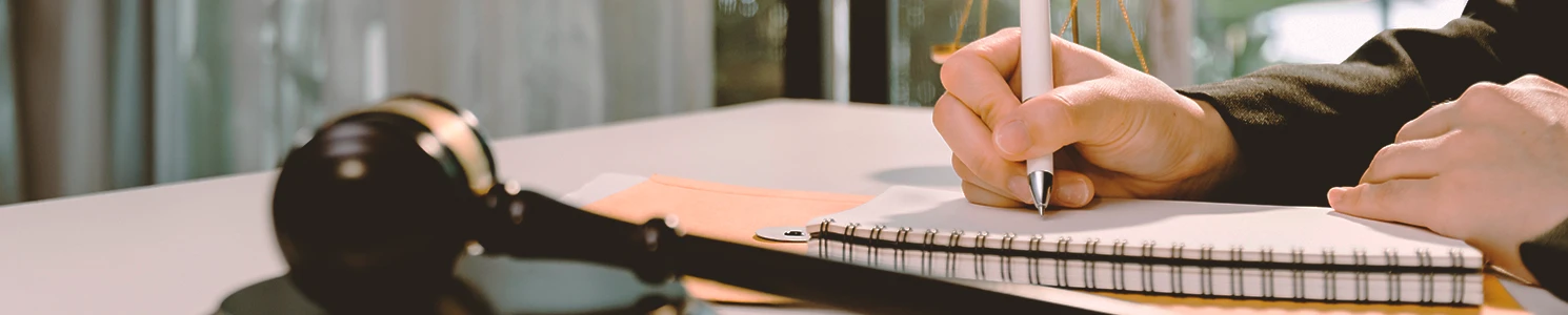 A lawyer filing a malpractice lawsuit in an office