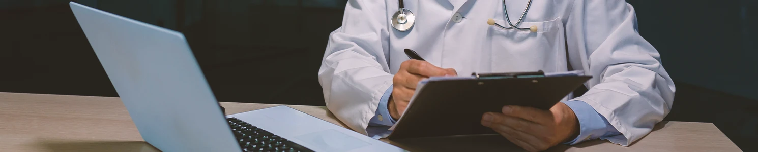 A doctor researching the symptoms of IVC filters