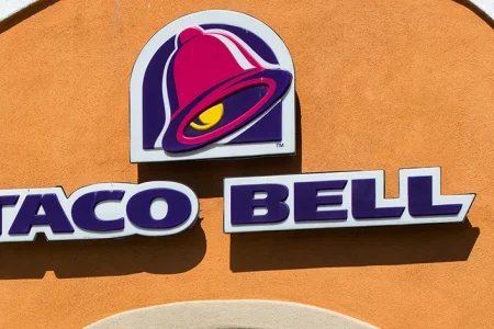 A close up shot of Taco Bell logo from its physical store