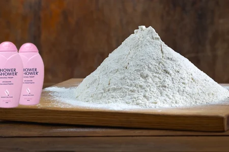 Shower-to-Shower baby powder and talcum powder in the background
