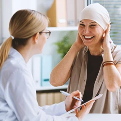 A doctor explaining to a patient the causes of lymphoma glyphosate