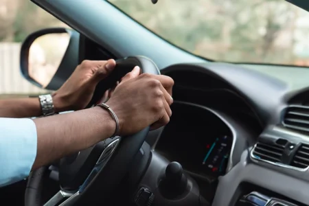 A man inside a car driving