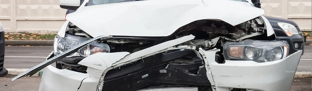 Front view of a severely damaged car