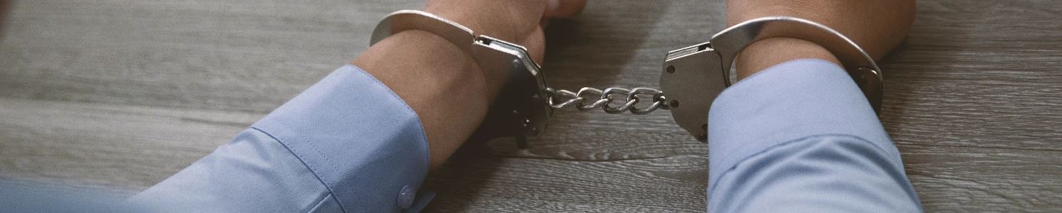 A person in handcuffs