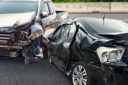 Two cars on the road that gets in an accident