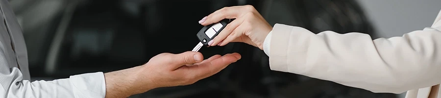 A person lending a car to a friend
