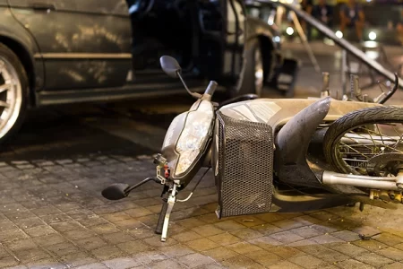 An accident between a motorcycle and a car