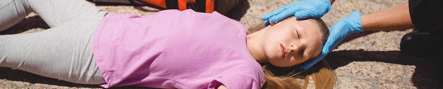 A girl being checked by medics