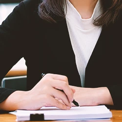 A lawyer writing down notes