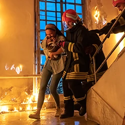 A person evacuating from fire incident
