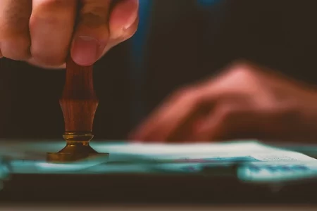 A lawyer stamping a paper