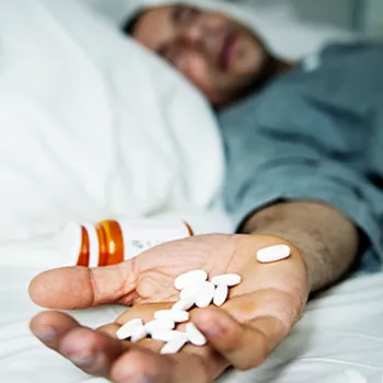 Overdosed patient in a hospital bed