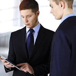 A lawyer showing something to his client