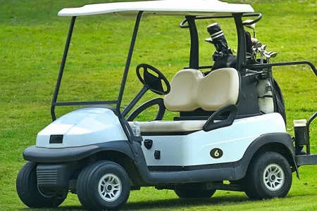 A Yamaha golf cart on a golf course