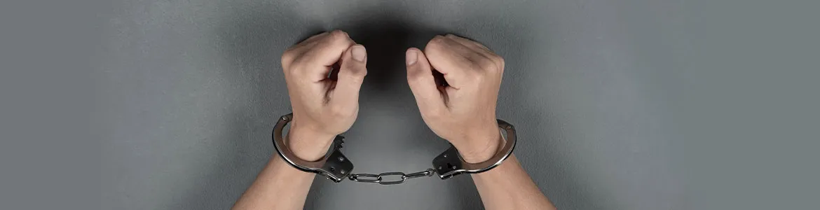 hand view of a person in hand cuffs