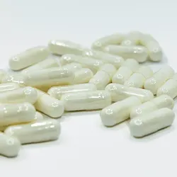 stack of white capsules