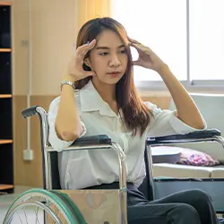 woman seated on a wheel chair